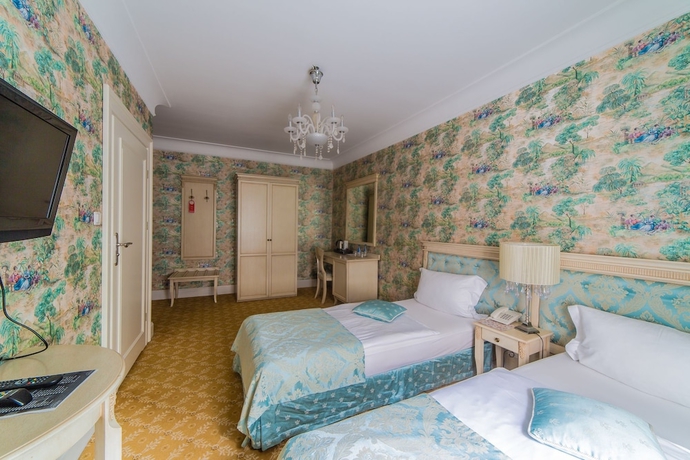 Imagen de la habitación del Hotel Garden Boutique Residence. Foto 13