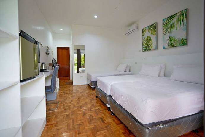 Imagen de la habitación del Hotel Garden Bungalows Resort. Foto 26