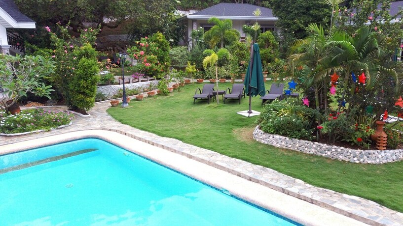Imagen de la piscina del Hotel Garden Bungalows Resort. Foto 28