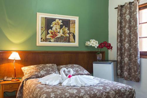 Imagen de la habitación del Hotel Garden, Campos do Jordao. Foto 6