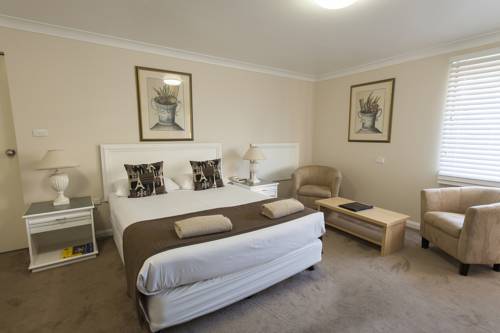 Imagen de la habitación del Hotel Garden City Motor Inn. Foto 4