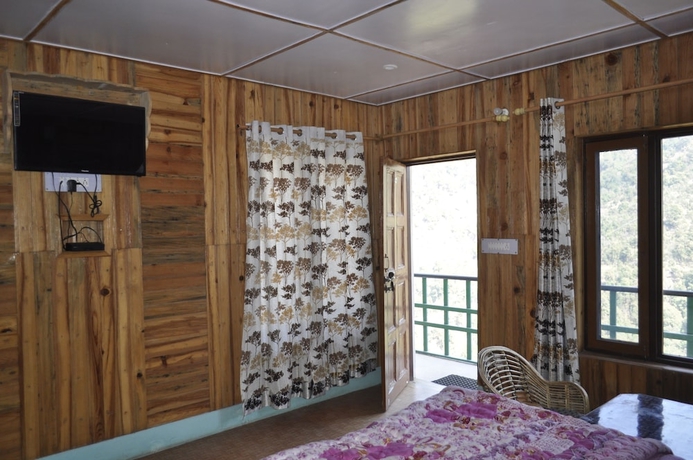 Imagen de la habitación del Hotel Garden Cottage and Restaurant. Foto 6