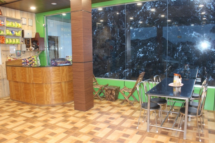 Imagen del bar/restaurante del Hotel Garden Cottage and Restaurant. Foto 3