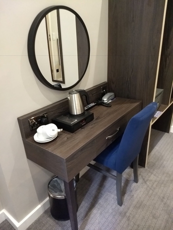 Imagen de la habitación del Hotel Garden Court, Londres. Foto 3