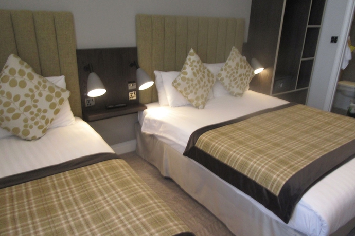 Imagen de la habitación del Hotel Garden Court, Londres. Foto 4