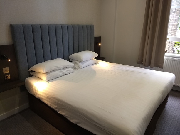 Imagen de la habitación del Hotel Garden Court, Londres. Foto 5