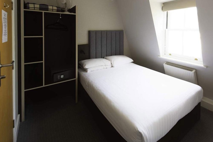 Imagen de la habitación del Hotel Garden Court, Londres. Foto 6