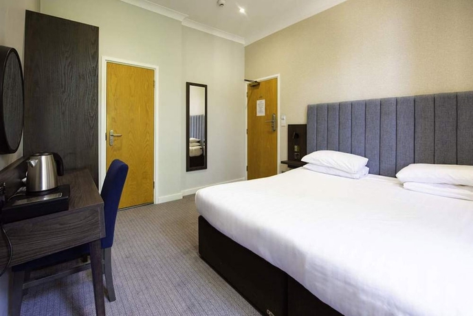 Imagen de la habitación del Hotel Garden Court, Londres. Foto 7