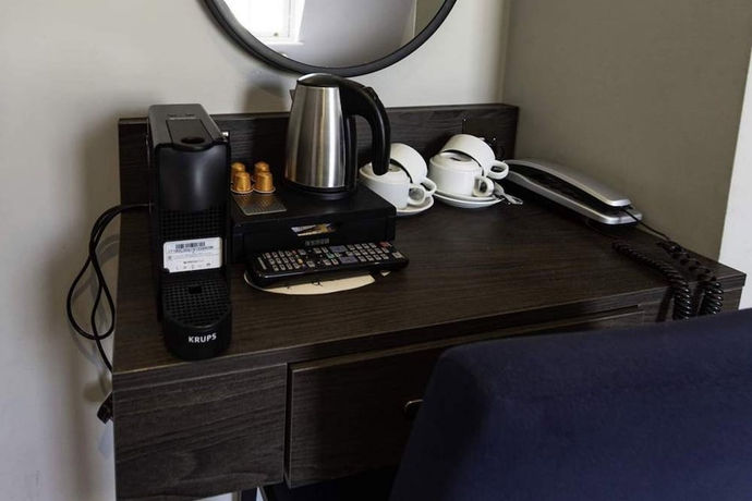 Imagen de la habitación del Hotel Garden Court, Londres. Foto 8