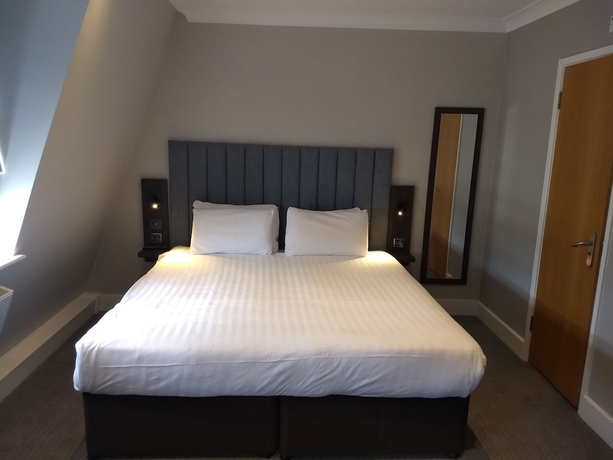 Imagen de la habitación del Hotel Garden Court, Londres. Foto 15