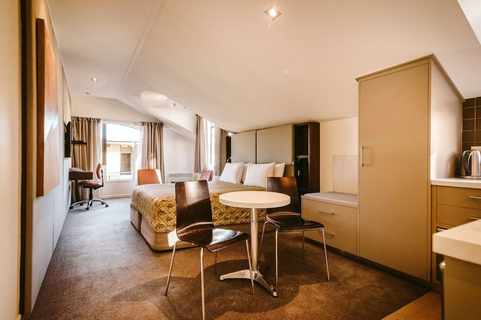 Imagen de la habitación del Hotel Garden Court Suites And Apartments. Foto 5