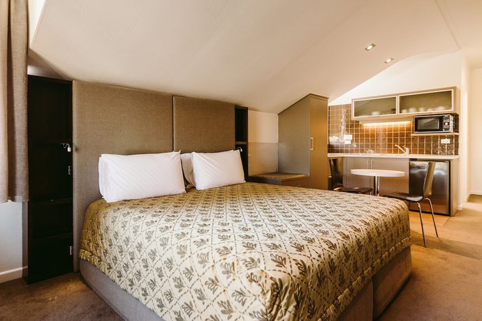 Imagen de la habitación del Hotel Garden Court Suites And Apartments. Foto 6