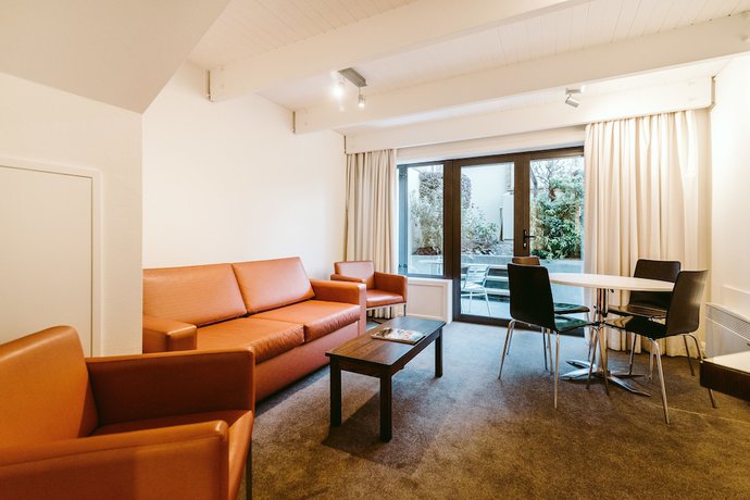 Imagen de la habitación del Hotel Garden Court Suites And Apartments. Foto 12