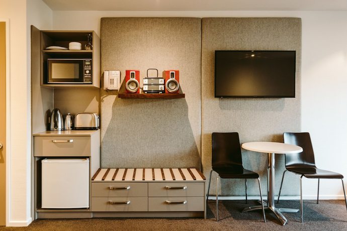 Imagen de la habitación del Hotel Garden Court Suites And Apartments. Foto 17