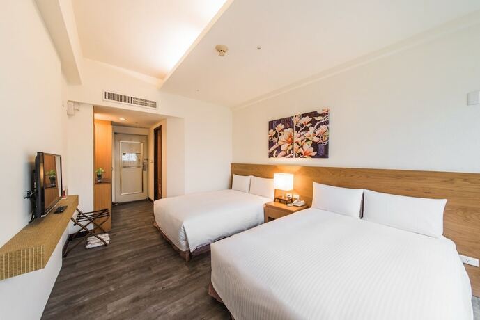 Imagen de la habitación del Hotel Garden Education Culture Hotel. Foto 12