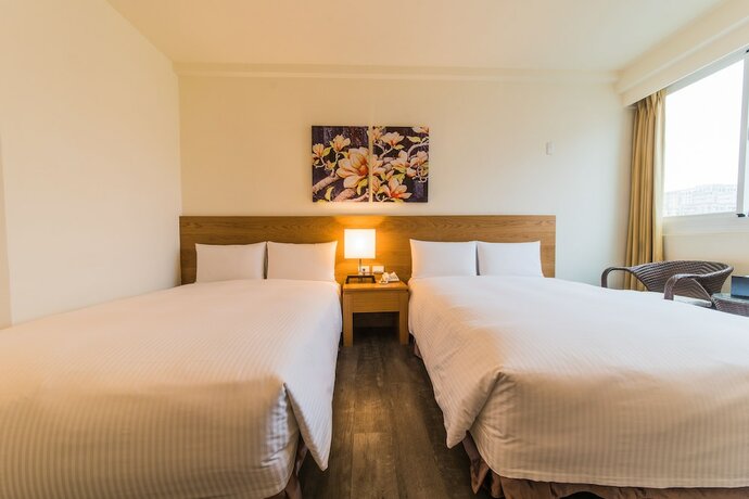 Imagen de la habitación del Hotel Garden Education Culture Hotel. Foto 16