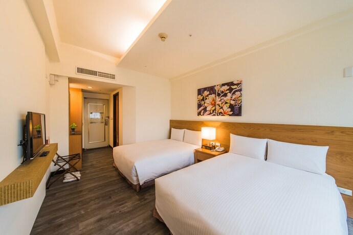 Imagen de la habitación del Hotel Garden Education Culture Hotel. Foto 18