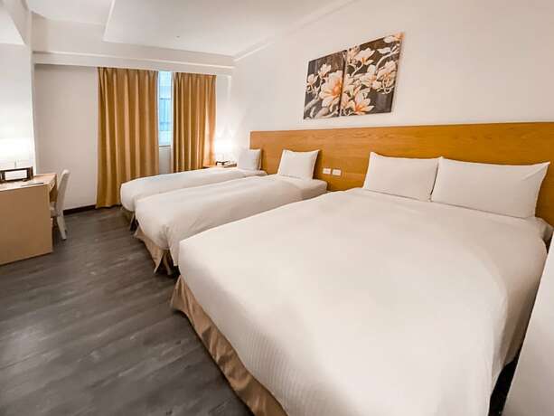 Imagen de la habitación del Hotel Garden Education Culture Hotel. Foto 22