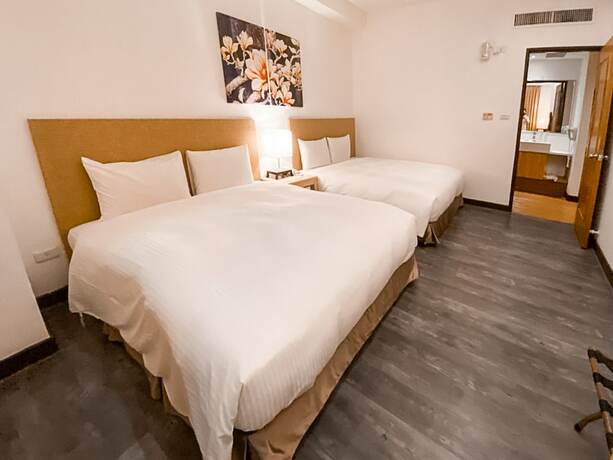 Imagen de la habitación del Hotel Garden Education Culture Hotel. Foto 23