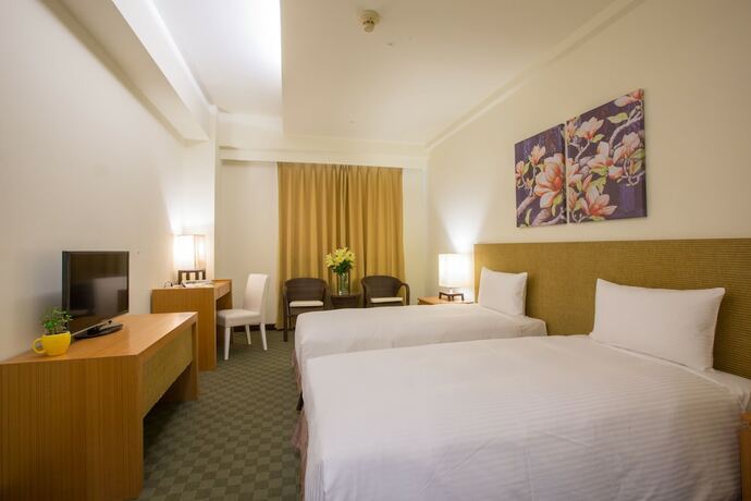 Imagen de la habitación del Hotel Garden Education Culture Hotel. Foto 24