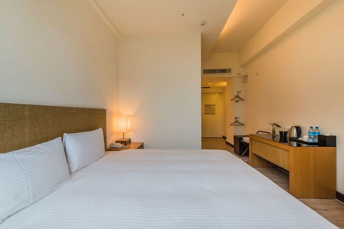 Imagen de la habitación del Hotel Garden Education Culture Hotel. Foto 30