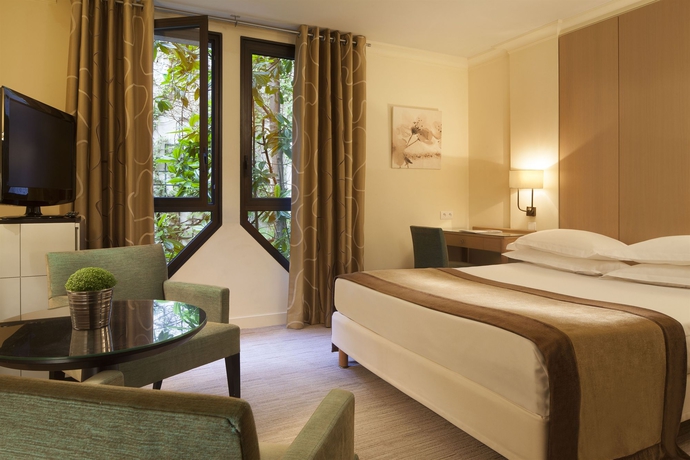 Imagen de la habitación del Hotel Garden Elysee. Foto 12