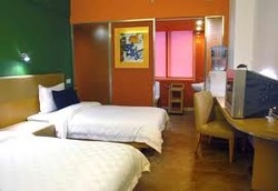 Imagen de la habitación del Hotel Garden Inn 4th Zhongshan Road Branch. Foto 2