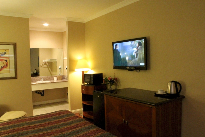 Imagen de la habitación del Hotel Garden Inn. Foto 7