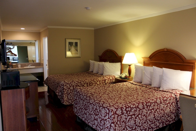 Imagen de la habitación del Hotel Garden Inn. Foto 11