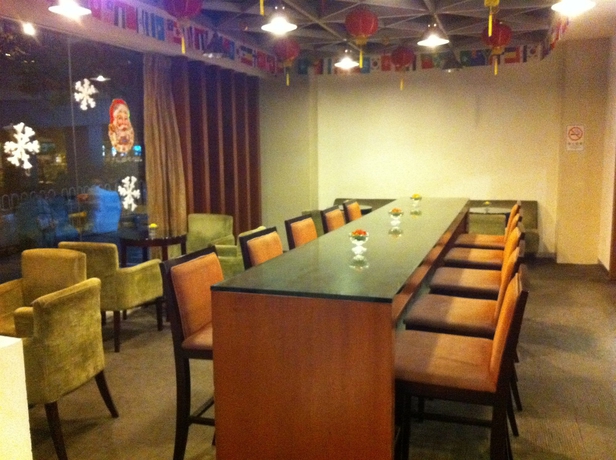 Imagen del bar/restaurante del Hotel Garden Inn Liwan Lake Branch. Foto 2