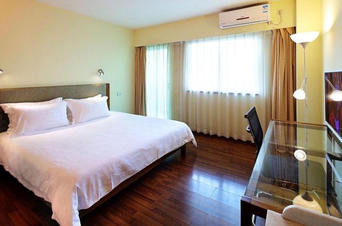 Imagen de la habitación del Hotel Garden Inn Yile Road Branch. Foto 3