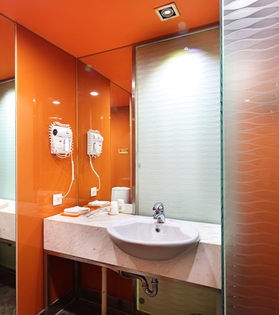 Imagen de la habitación del Hotel Garden Inn Yile Road Branch. Foto 6