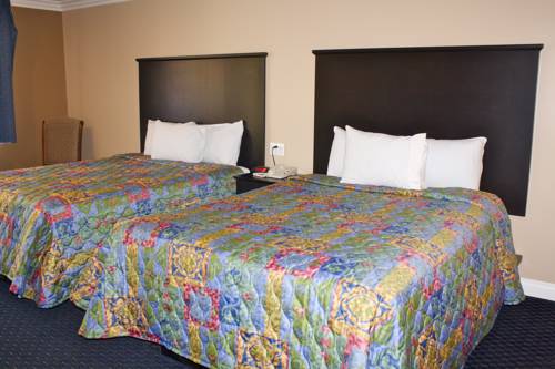 Imagen de la habitación del Hotel Garden Inn and Suites. Foto 3