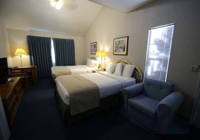 Imagen de la habitación del Hotel Garden Inn and Suites. Foto 9