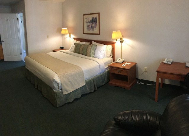 Imagen de la habitación del Hotel Garden Inn and Suites. Foto 14