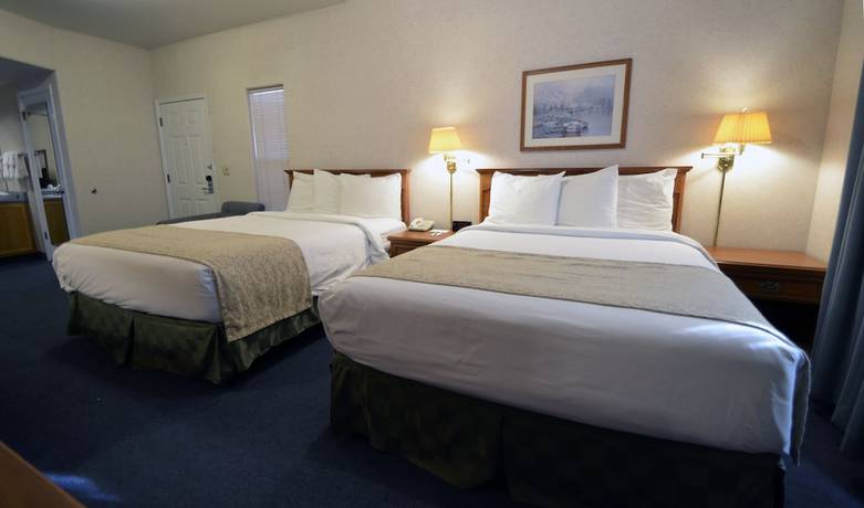 Imagen de la habitación del Hotel Garden Inn and Suites. Foto 16