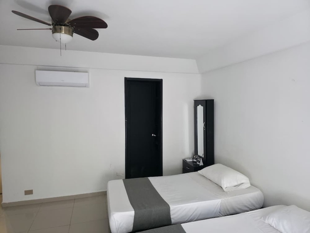 Imagen de la habitación del Hotel Garden Laureles. Foto 7