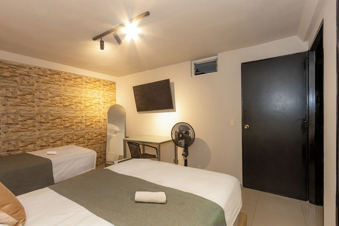 Imagen de la habitación del Hotel Garden Laureles. Foto 8
