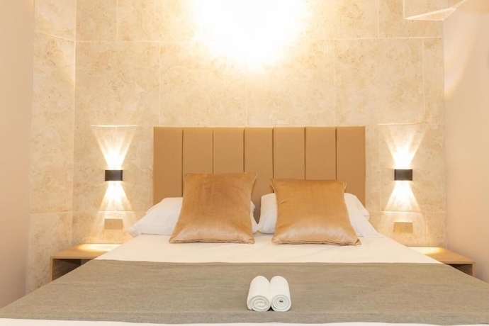 Imagen de la habitación del Hotel Garden Laureles. Foto 10