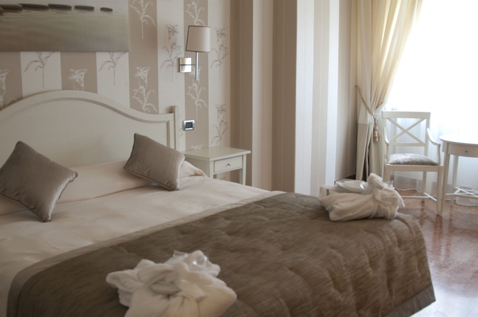 Imagen de la habitación del Hotel Garden Lido. Foto 7