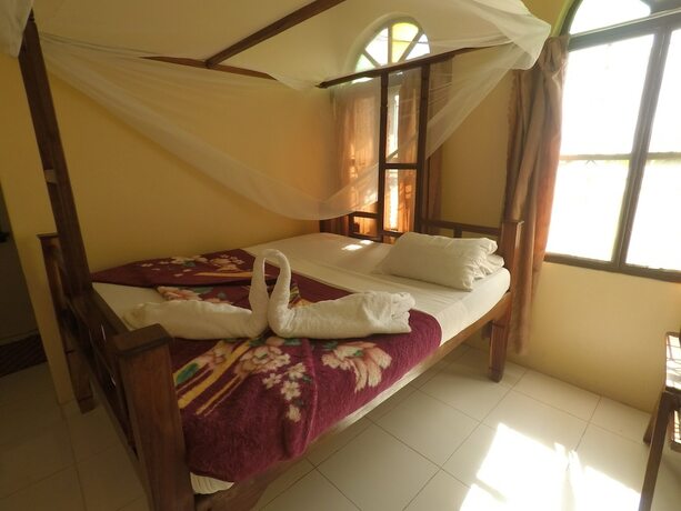 Imagen de la habitación del Hotel Garden Lodge. Foto 15