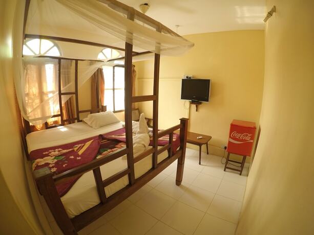 Imagen de la habitación del Hotel Garden Lodge. Foto 16