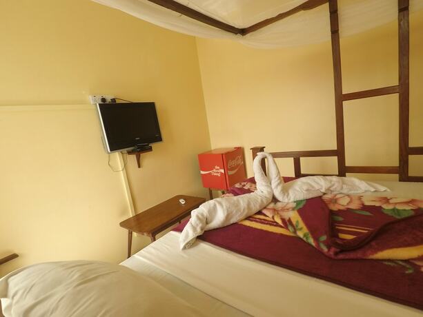 Imagen de la habitación del Hotel Garden Lodge. Foto 17