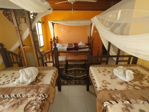 Imagen de la habitación del Hotel Garden Lodge. Foto 18