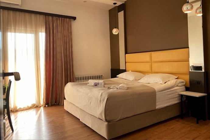 Imagen de la habitación del Hotel Garden Lounge. Foto 5