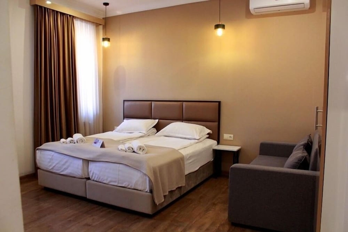 Imagen de la habitación del Hotel Garden Lounge. Foto 8