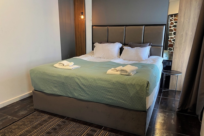 Imagen de la habitación del Hotel Garden Lounge. Foto 10