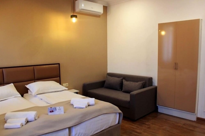 Imagen de la habitación del Hotel Garden Lounge. Foto 13