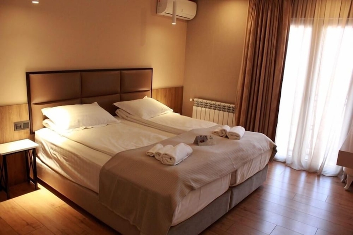 Imagen de la habitación del Hotel Garden Lounge. Foto 15