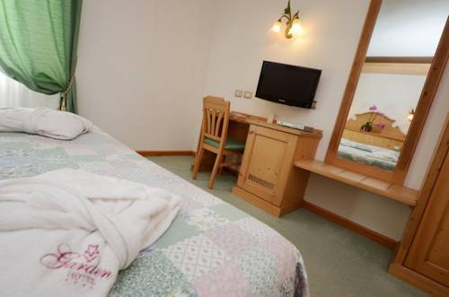 Imagen de la habitación del Hotel Garden, Moena - Alpe Lusia. Foto 7
